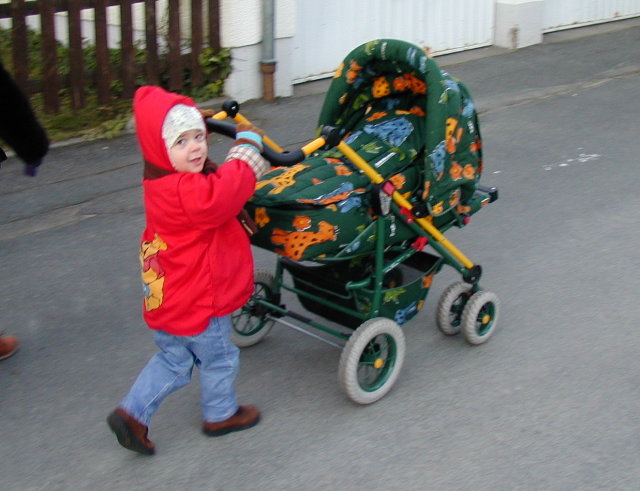 [Nicolas takes Marcus for his first trip in the stroller, 13 Jan 2001]